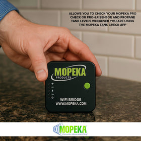 Mopeka bridge mounted in an RV interior showing remote monitoring convenience
