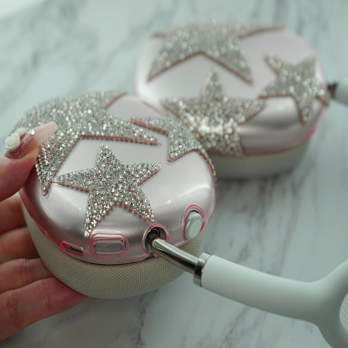 MORWLAT AirPods Max case featuring rhinestone stars adds sparkle and scratch resistance.