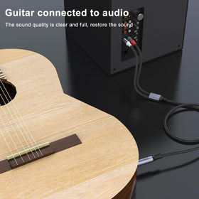 MOSWAG dual RCA plugs connected to a mixer for clean left and right channel audio.