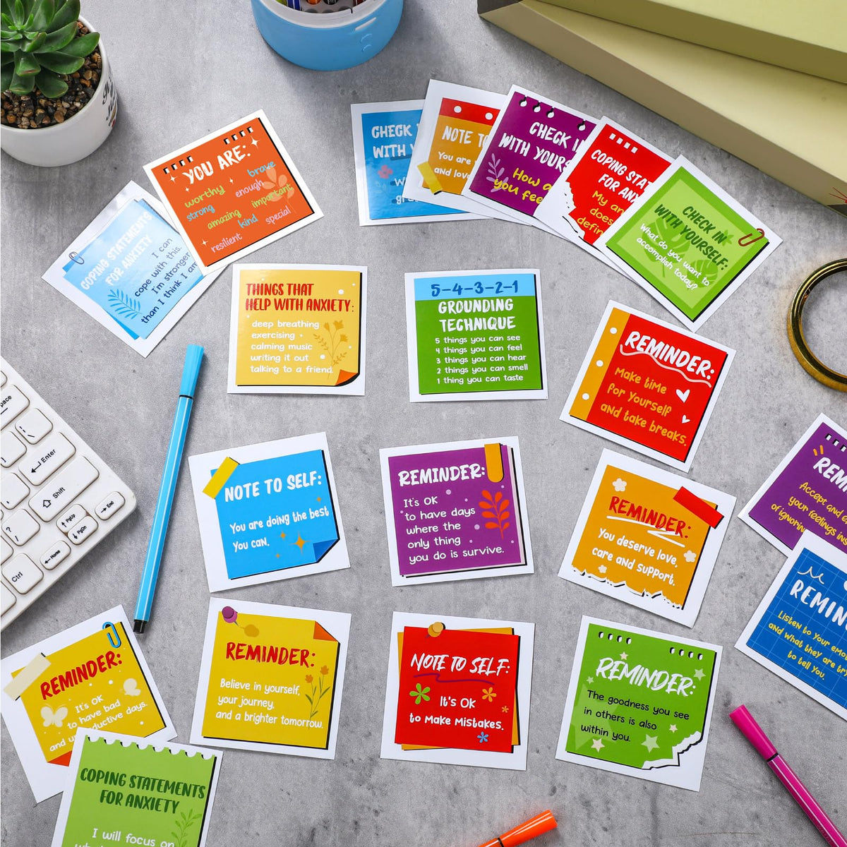 Motipuns waterproof stickers decorate a laptop and water bottle for durability.