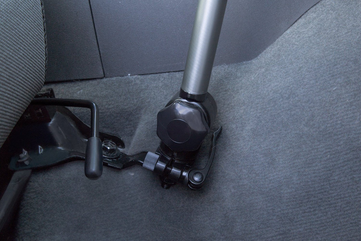 Mount-It! laptop vehicle mount secure tray with teeth locks the laptop.