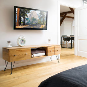 Mount-It! wall mount shown flush to wall saving space in a room