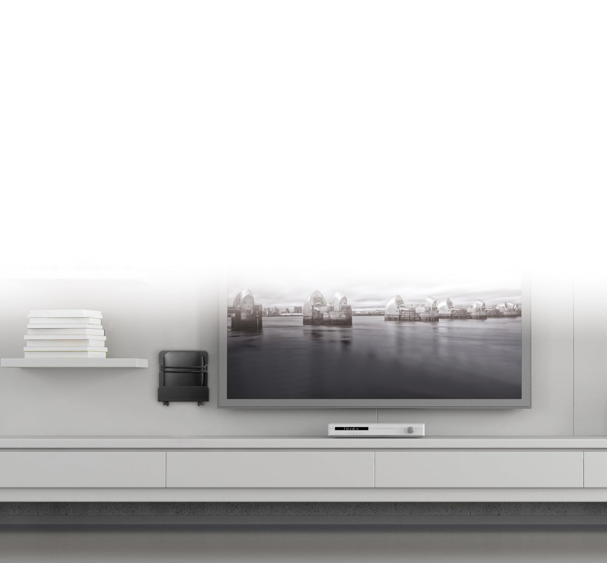 Mount Plus MP-APM-06-01 behind TV setup for tidy, space-saving mounting