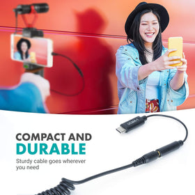 Movo UCMA-1 with mic setup beside a camera shows versatile field recording.