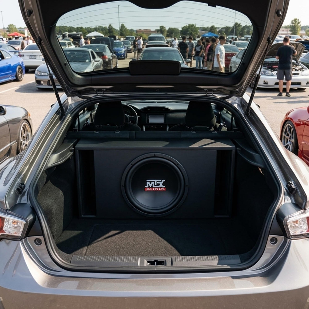 MTX Audio TN12-04 mounted in an enclosure for optimized bass response.