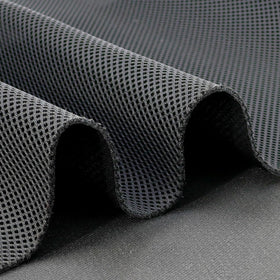 M Mute Touch black grill cloth portrait demonstrates sleek aesthetics for speakers