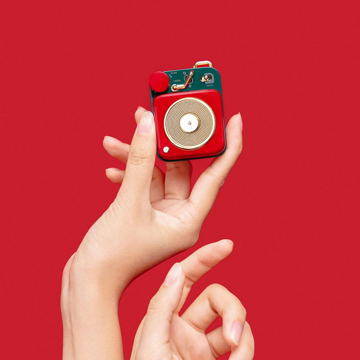Muzen Button rotary knob for effortless one-handed volume and track control.