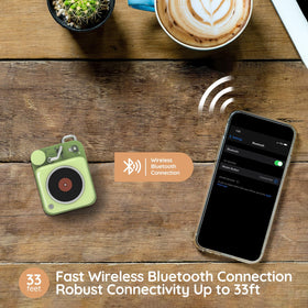 Muzen Button on office desk setup highlighting portable sound for meetings