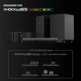 Nakamichi remote in hand controlling soundbar showing ergonomic grip and quick access