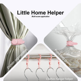Nearockle pink silicone ties used in a kitchen drawer for organized cables.