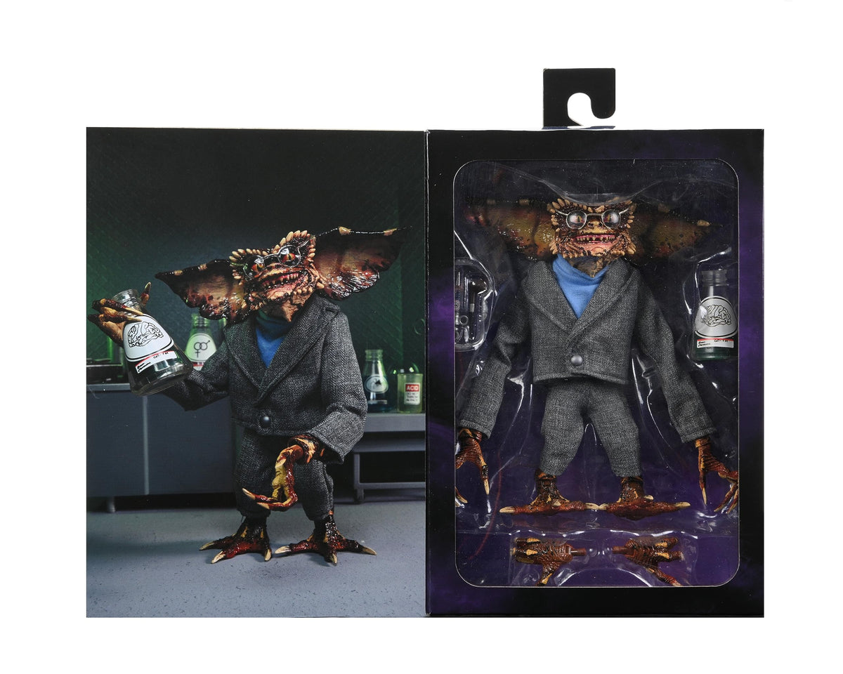 NECA Brain Gremlin beside ruler showing 6-inch height for size clarity