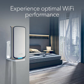 NETGEAR mounted router in living room showing improved placement benefit