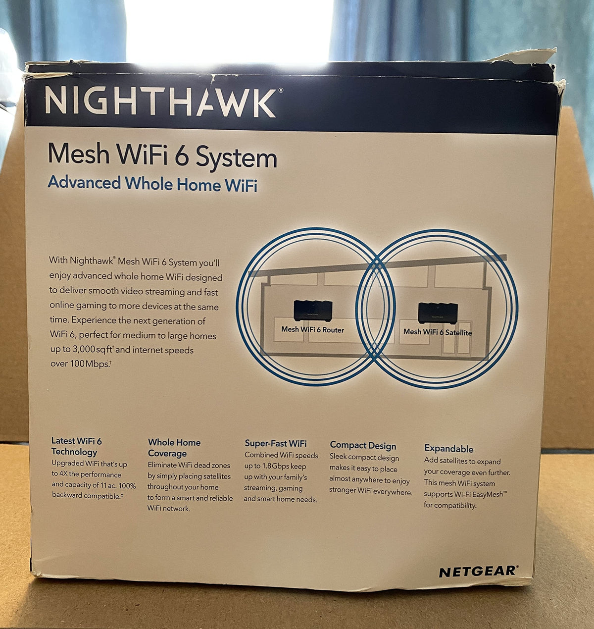 NETGEAR Nighthawk MK62 satellite extender expanding reliable WiFi upstairs