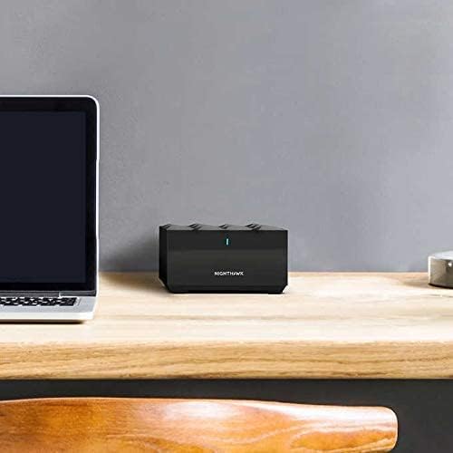 NETGEAR Nighthawk MK63S AX1800 satellite extending mesh coverage to far rooms