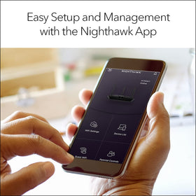 NETGEAR Nighthawk beside gaming console showing low‑latency wired benefit