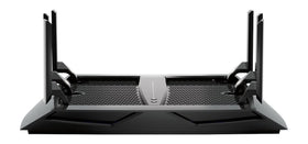 NETGEAR Nighthawk X6 in living room setup enhancing gaming and streaming.