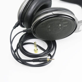 NewFantasia cable beside headphones demonstrates easy plug-and-play setup.