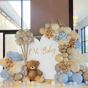 Newleafly arch cover used in a photo booth setup for stylish party photos
