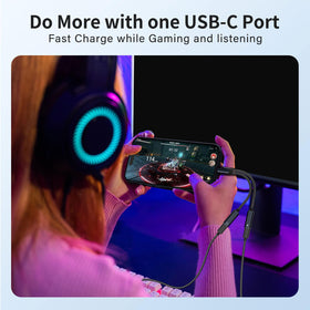 NICE BUDDY connected to a phone and wired headphones for simultaneous use and charge