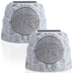 NiceBuy solar rock speakers illuminate outdoors with ambient RGB lighting.