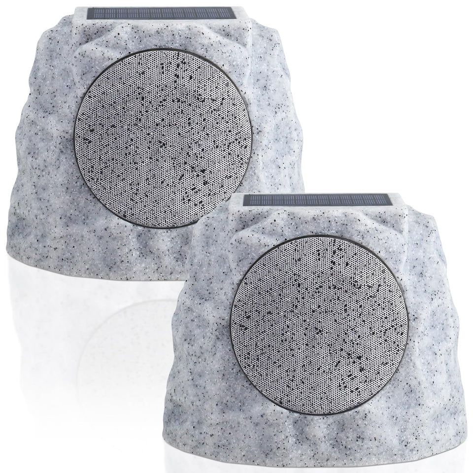 NiceBuy solar rock speakers illuminate outdoors with ambient RGB lighting.