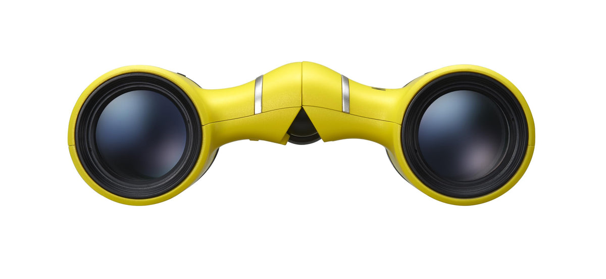 Nikon ACULON T02 8x21 yellow ergonomic hold highlighting comfortable grip for extended use