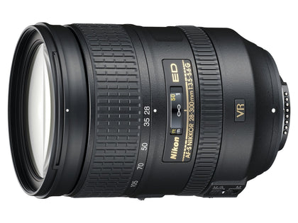 Nikon AF-S 28-300mm lens front element for versatile travel framing and sharpness