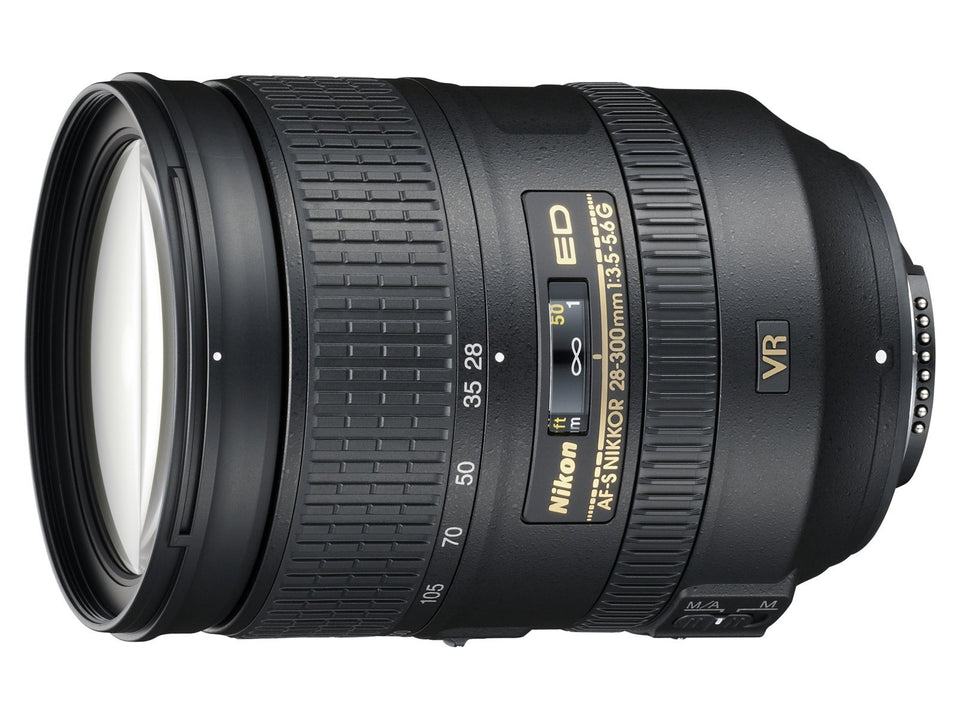 Nikon AF-S 28-300mm lens front element for versatile travel framing and sharpness