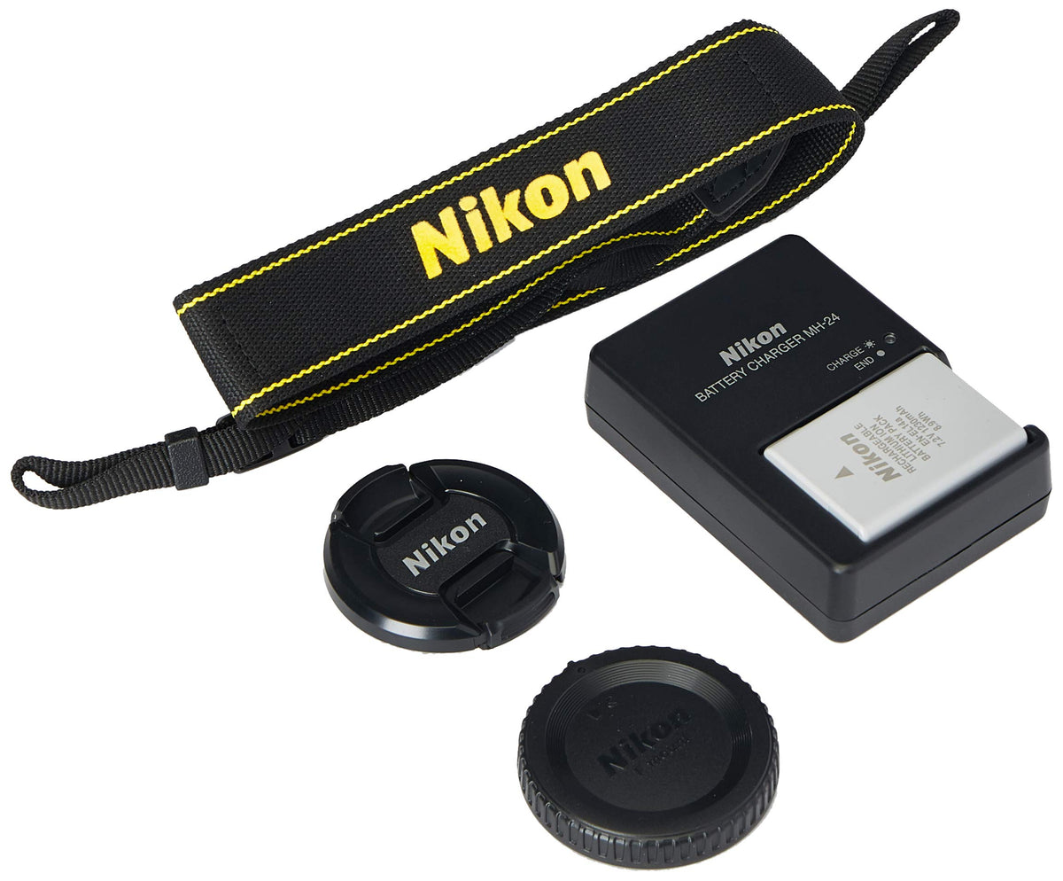 Nikon D3400 in hand on a travel-ready setup.