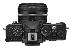 Nikon Z f side profile emphasizes compact full-frame form.