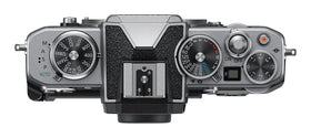 Nikon Z fc retro dials close-up emphasizes tactile shooting control in daylight.