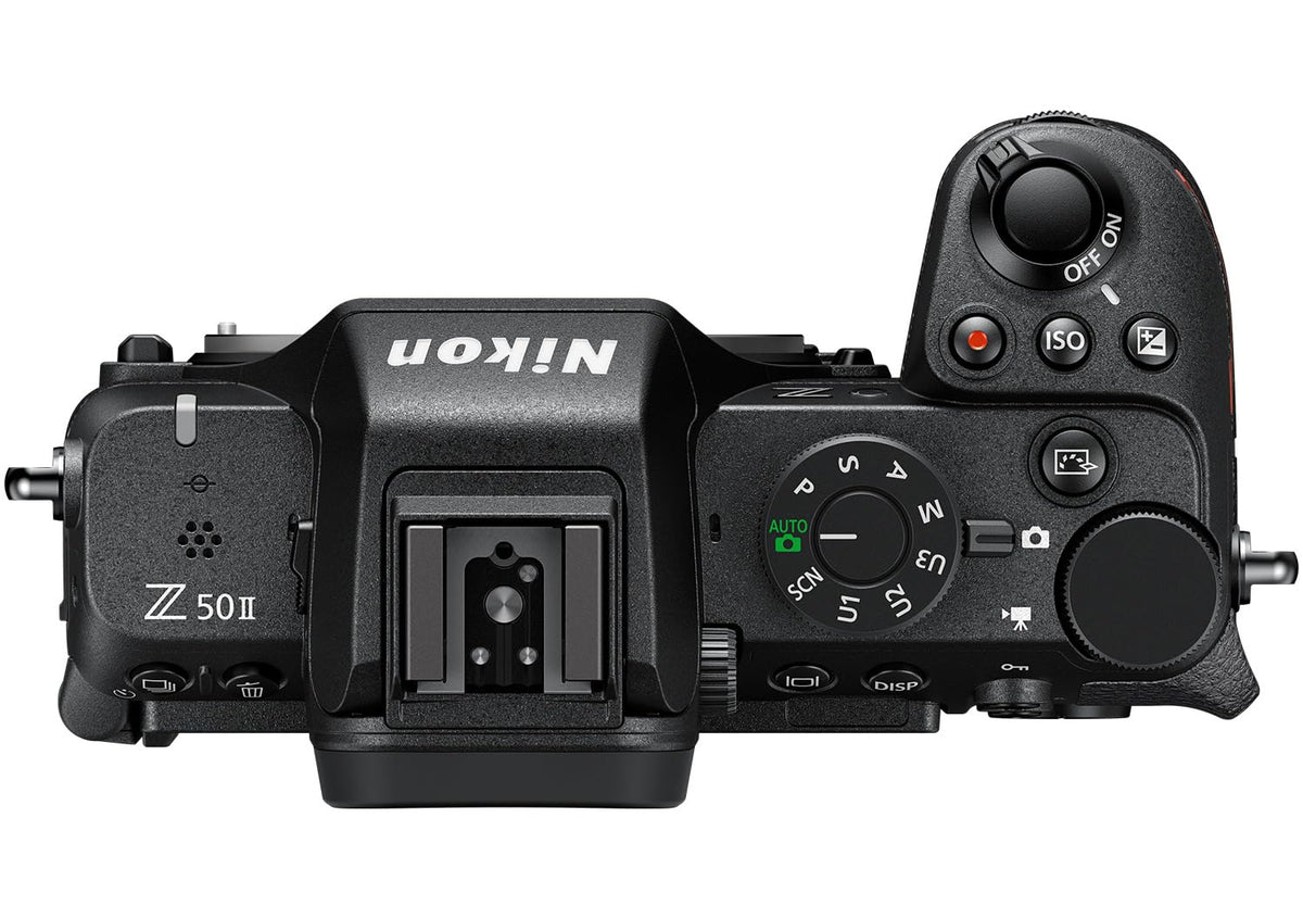 Nikon Z50 II camera on table highlights lightweight design for everyday use.