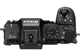 Nikon Z50 II camera on table highlights lightweight design for everyday use.