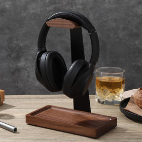 NIRVASH walnut stand dimensions show compact footprint on a busy desk.