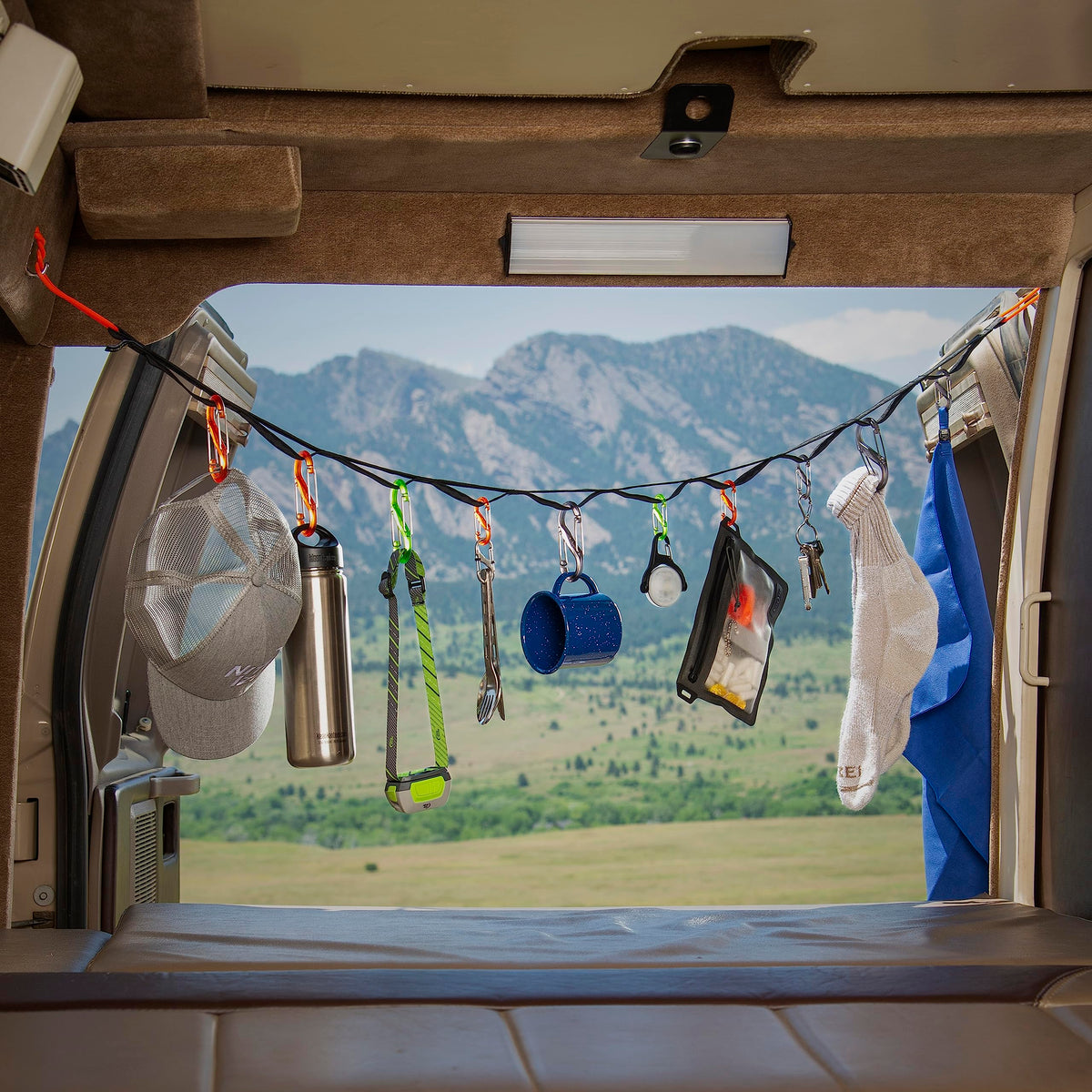 Nite Ize GearLine portable hanging system keeps camping gear accessible.