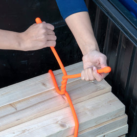 Nite Ize bundling extension cords in use for tidy cable management
