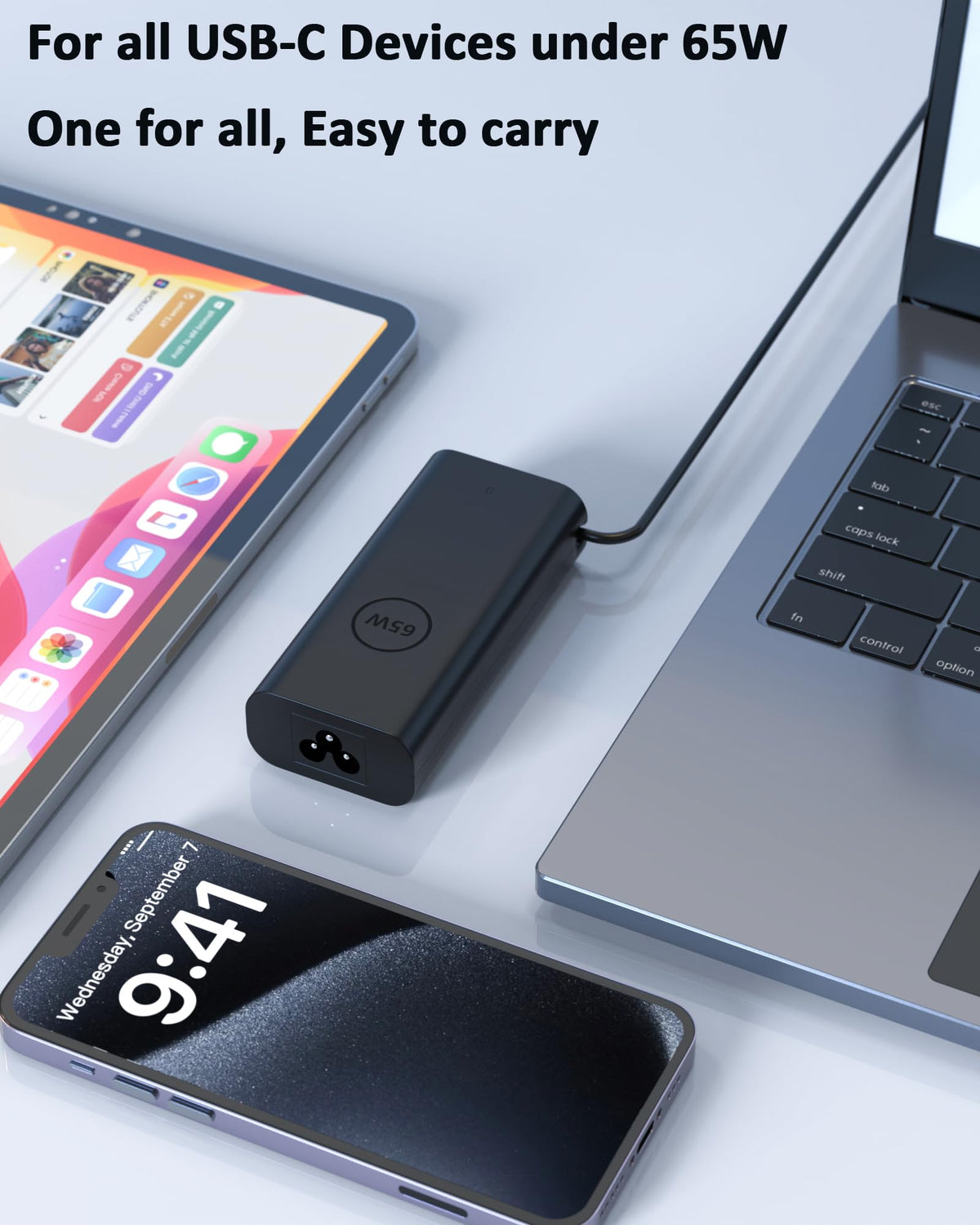 Nivjuky charger packed in a travel bag next to laptop, illustrating portability and convenience
