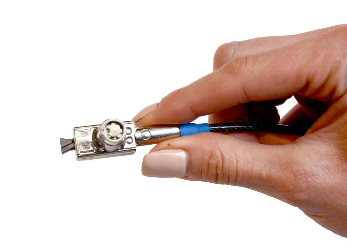 Noble Locks in an office setting securing laptop and peripherals for peace of mind