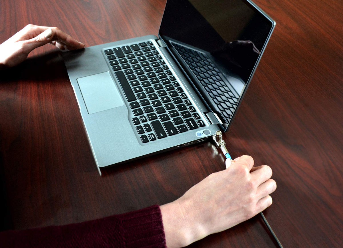 Noble Locks swivel head rotation shown allowing laptop to lay flat safely