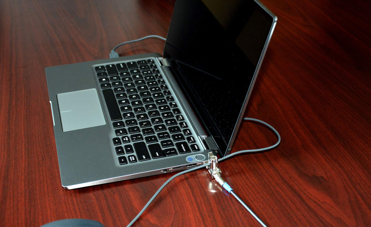 Noble Locks 6-foot cable alongside ruler showing length and anchoring options