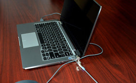 Noble Locks 6-foot cable alongside ruler showing length and anchoring options
