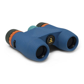 Nocs Provisions Standard Issue 8x25 front view showing compact rugged design for outdoor adventures.
