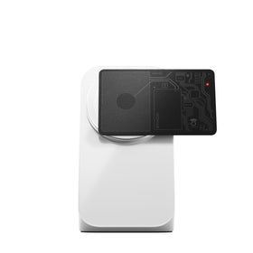 NOMAD tracking card close-up of the button showing quick pairing and reset control