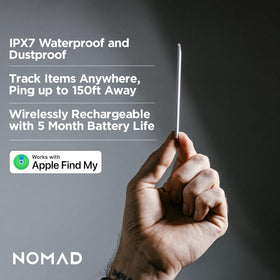 close-up of NOMAD tracking card logo and textured edge showing durable finish and premium build
