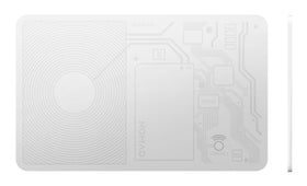 NOMAD tracking card thickness scale beside credit cards demonstrating minimal bulk and comfortable carry