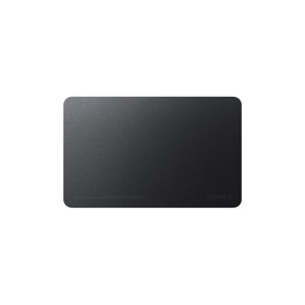NOMAD tracking card thickness compared to credit cards showing compact, low-profile fit
