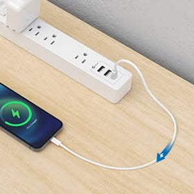NTONPOWER next to phone to show 15ft cord length and scale advantage