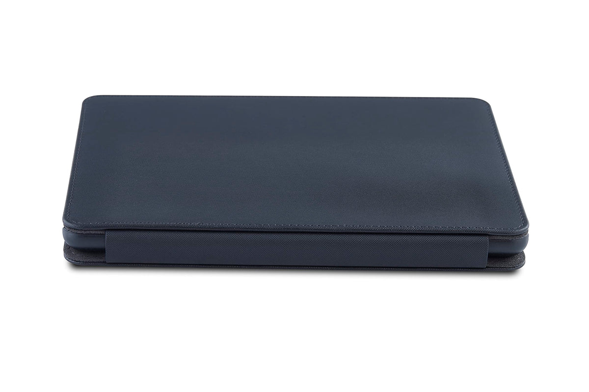 Nupro case next to a notebook showing size comparison and easy portability