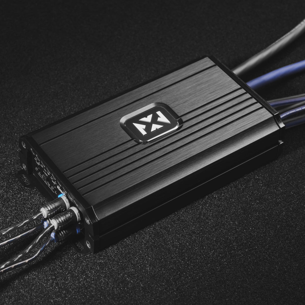 NVX NDA6004 back panel with versatile terminals for wiring setups.