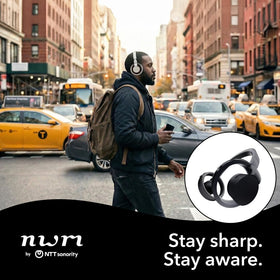 nwm ONE wireless open-ear headphones side fit highlighting lightweight comfort.